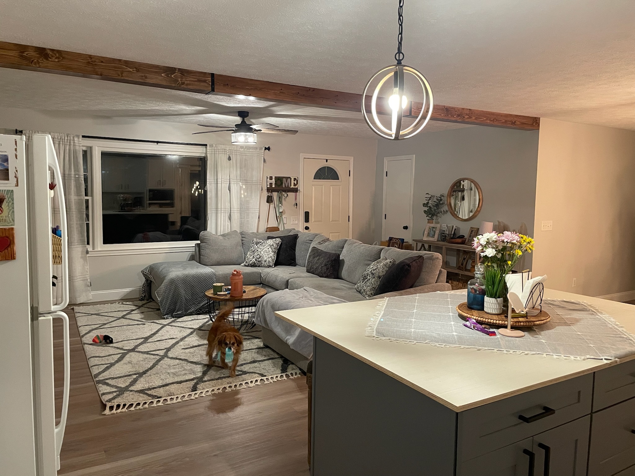 Open-concept living — pendant & fan