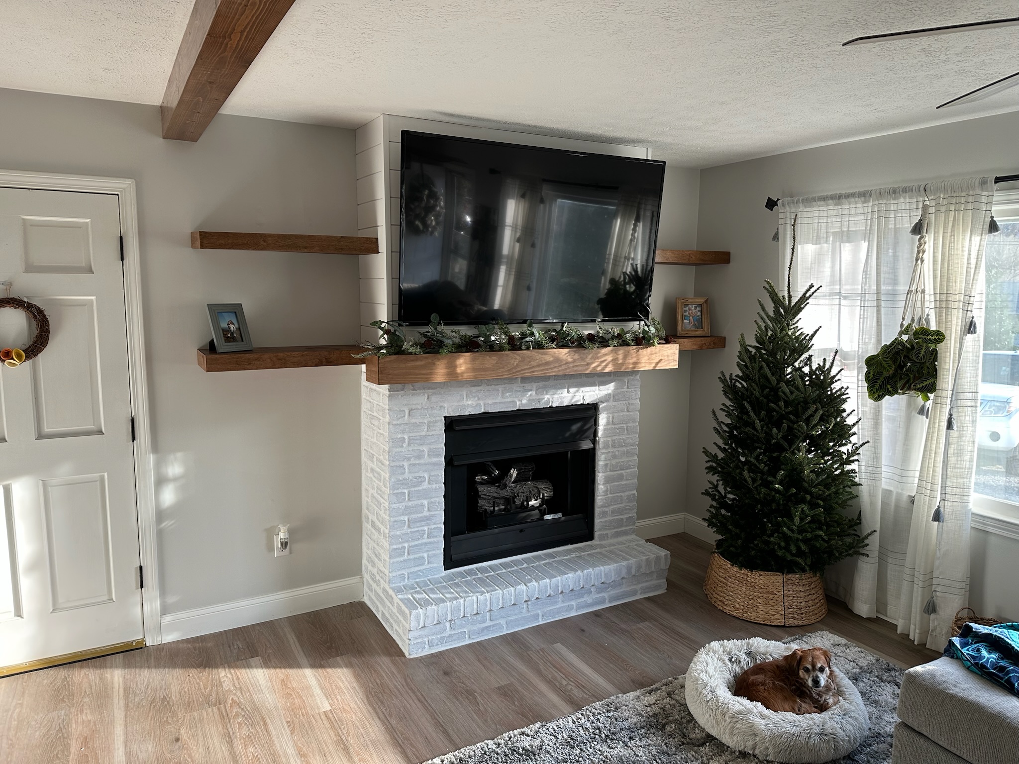 TV mount + media wiring — fireplace wall